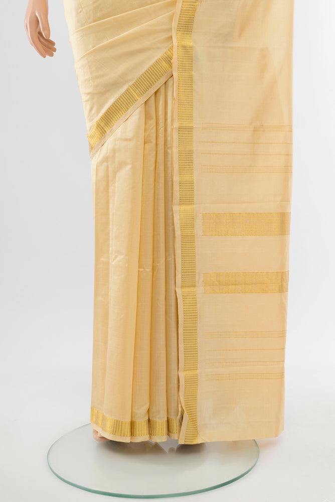 Pleats and pallu of Cream Kanjivaram Silk Saree with Plain Body and Silk Border. 