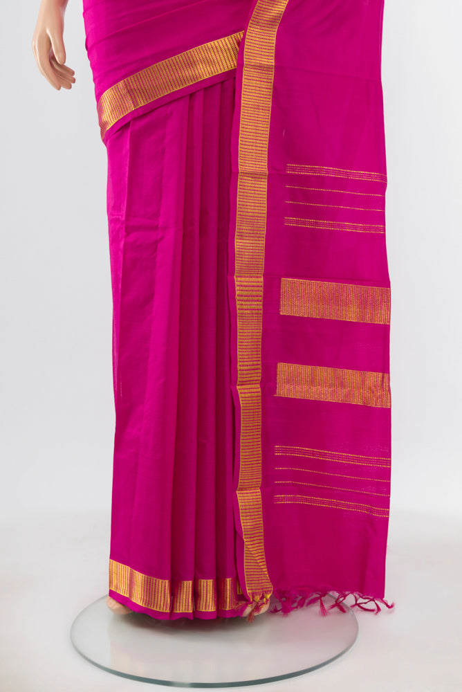 Pleats and pallu of Pure Silk Pure Zari Magenta Kanchipuram Saree with Checked design on the body and Silk Border. 