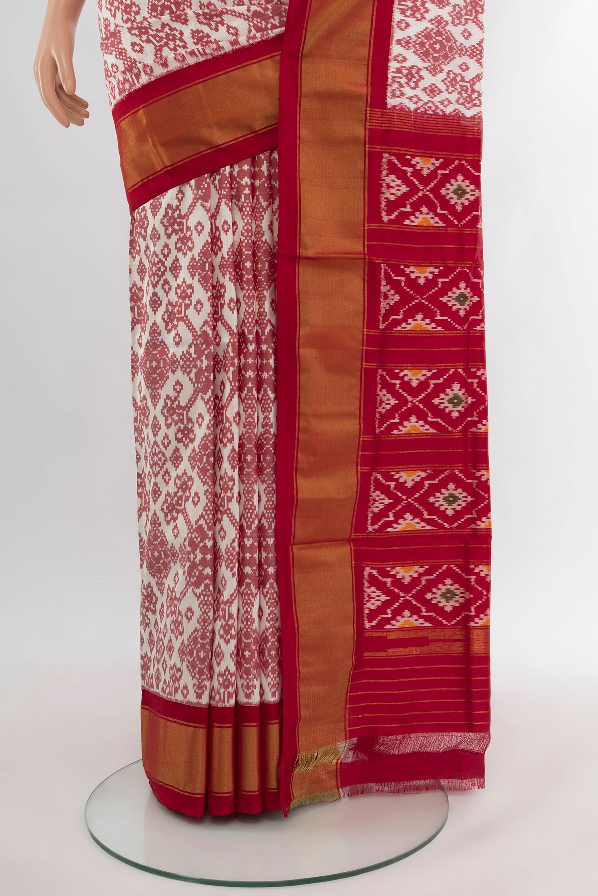 Pleats and pallu of Off White Pochampally Silk Saree with Pure Ikat on the body and Zari Border. 