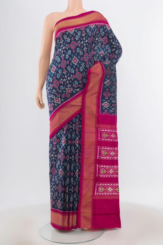 Pure Silk Pure Zari Multi Color Pochampally Saree with Ikat Print on the body and Silk Border.  displayed on a mannequin