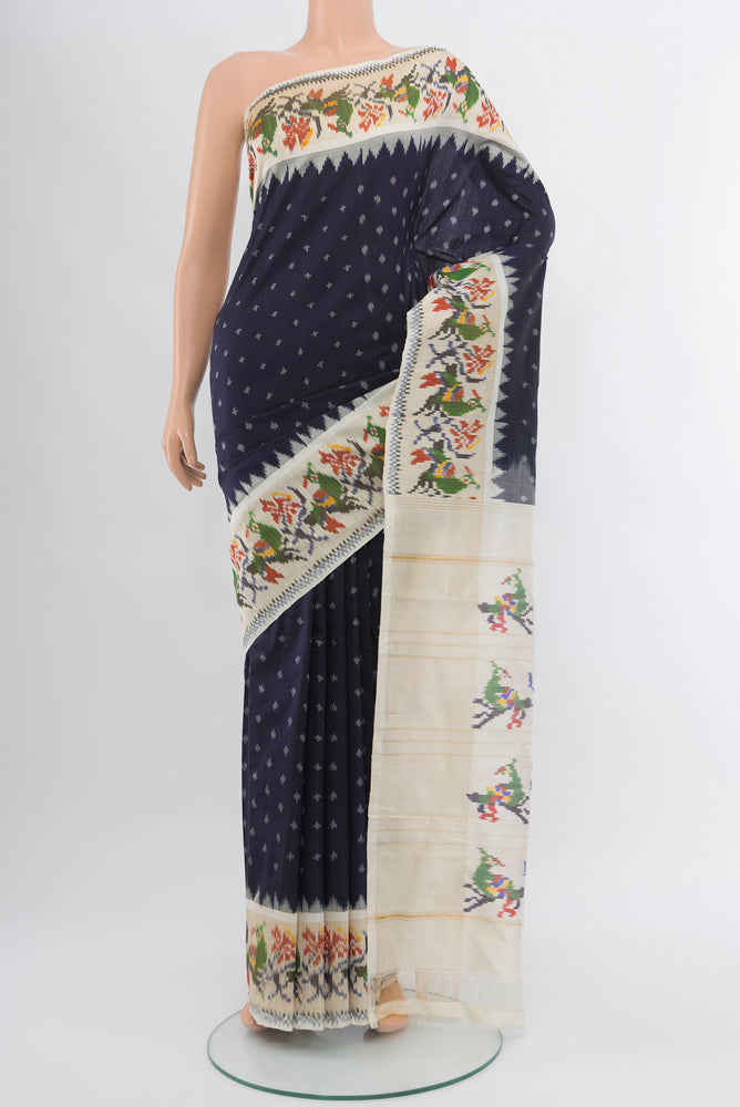 Navy Blue Pochampally Saree with Ikat Print on the body and Silk Border.  displayed on a mannequin