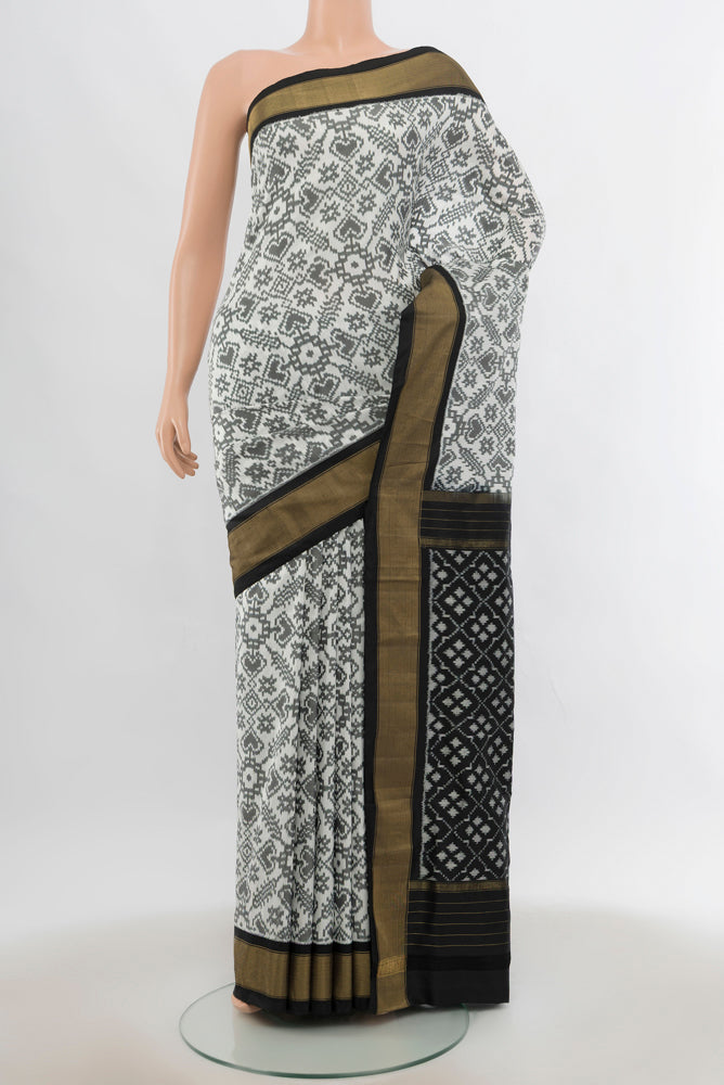 Multi Color Pochampally Saree with Ikat Print on the body and Silk Border.  displayed on a mannequin