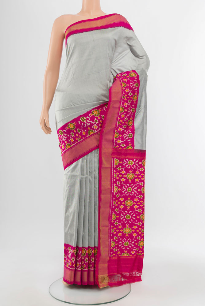 Davys Grey Pochampally Saree with Ikat Print on the body and Silk Border.  displayed on a mannequin