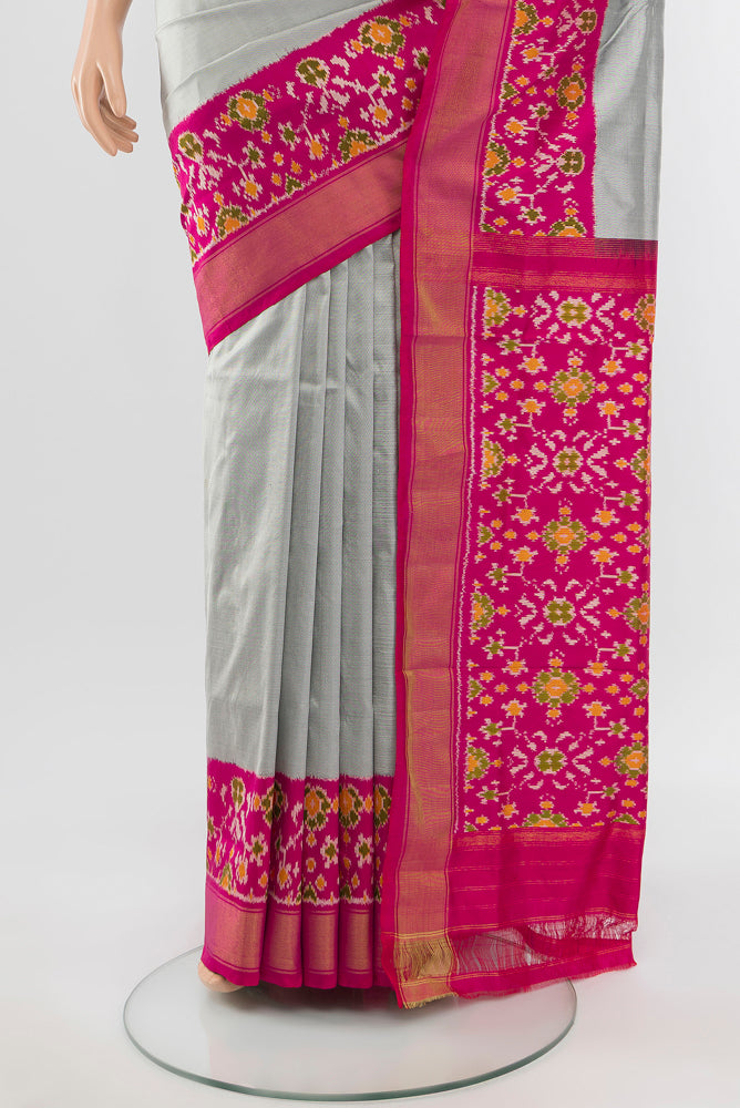 Pleats and pallu of Davys Grey Pochampally Saree with Ikat Print on the body and Silk Border. 
