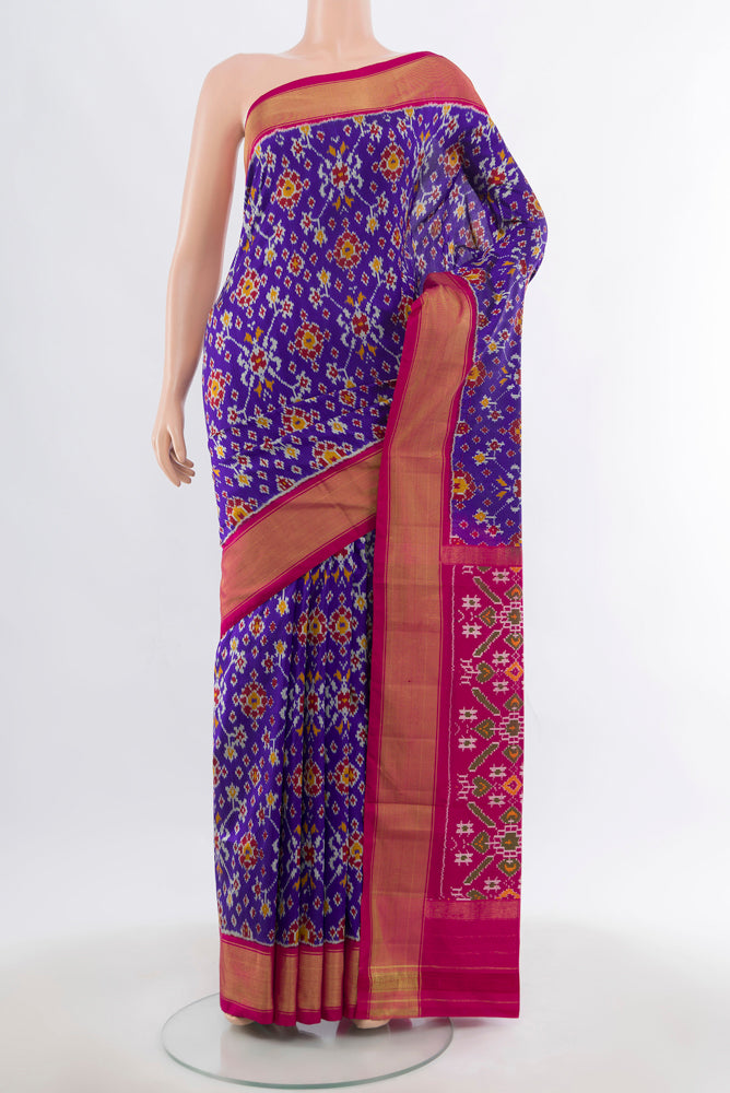 Dark Blue Pochampally Saree with Ikat Print on the body and Silk Border.  displayed on a mannequin