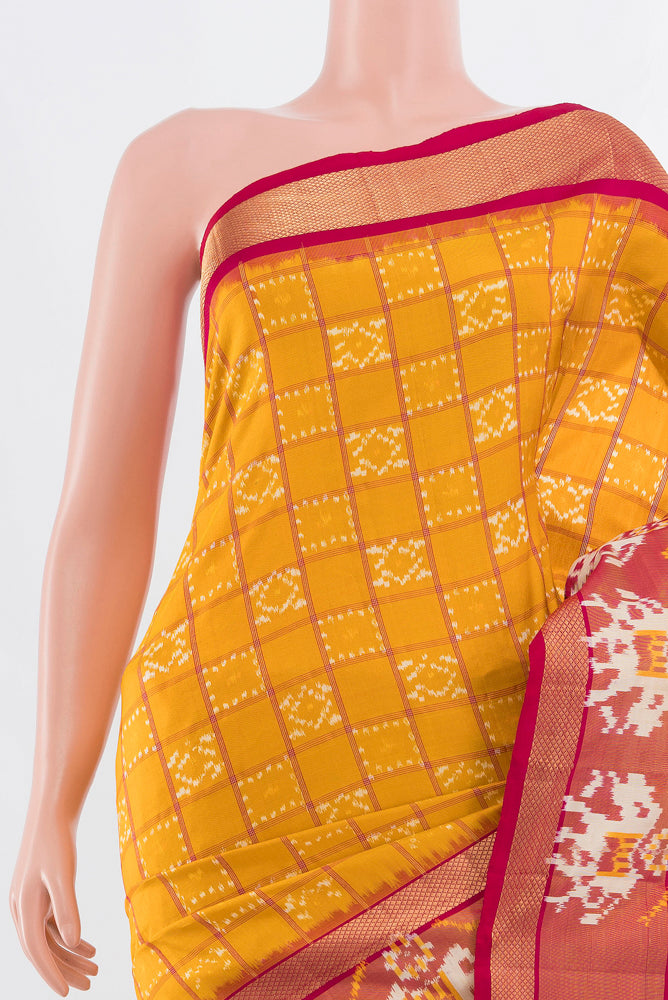 Border image of Yellow Pochampally Saree with Ikat Print on the body and Silk Border. 