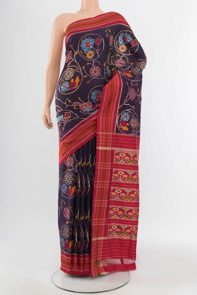 Navy Blue Pochampally Saree with Ikat Print on the body and Silk Border.  displayed on a mannequin