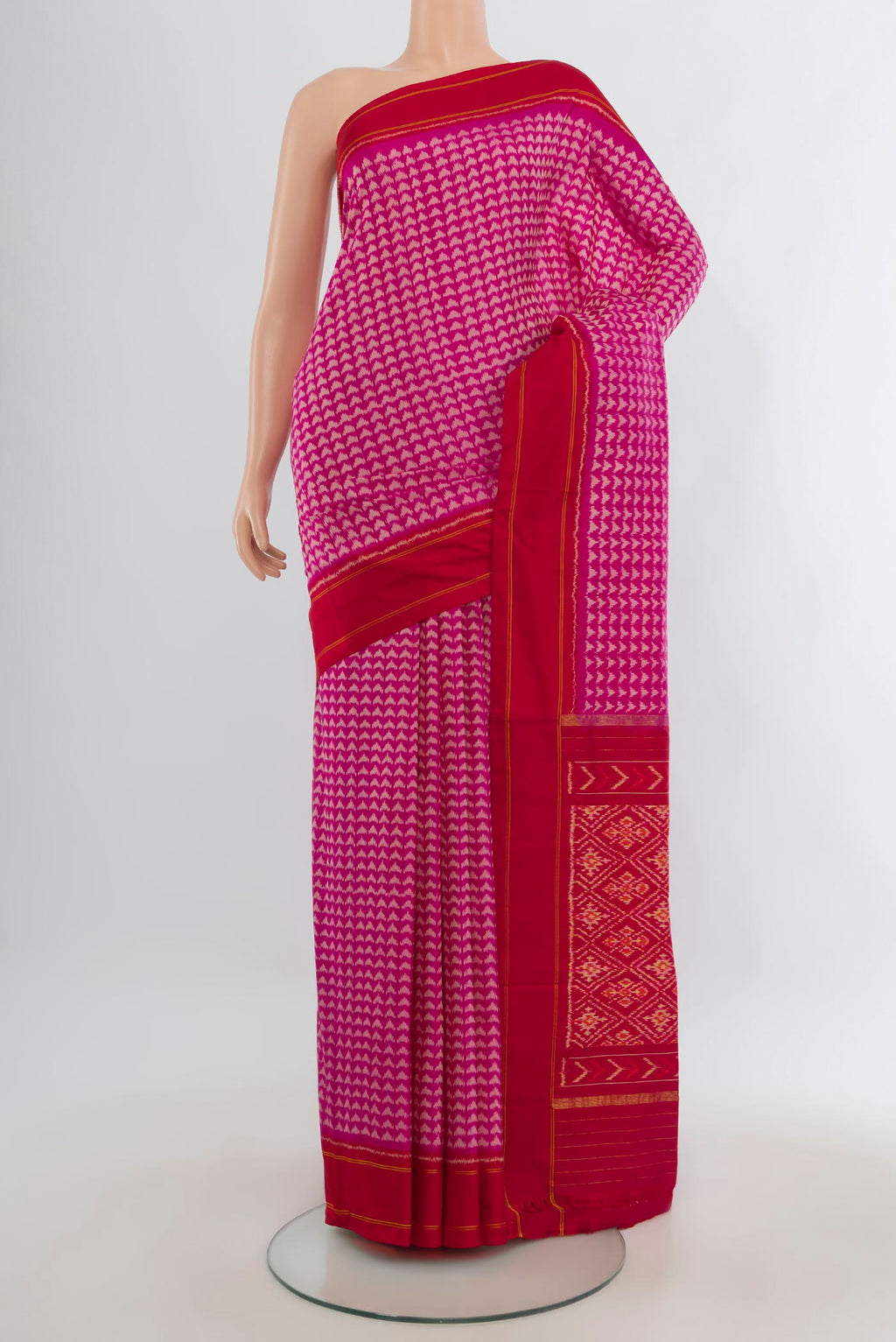 Pure Silk Pink Pochampally Saree with Pure Ikat on the body and Plain Border.  displayed on a mannequin