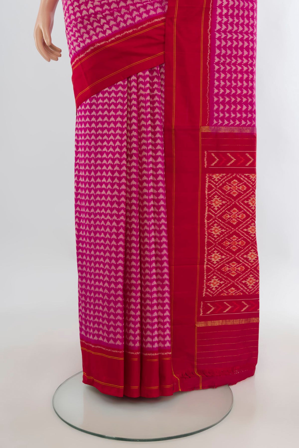 Pleats and pallu of Pure Silk Pink Pochampally Saree with Pure Ikat on the body and Plain Border. 