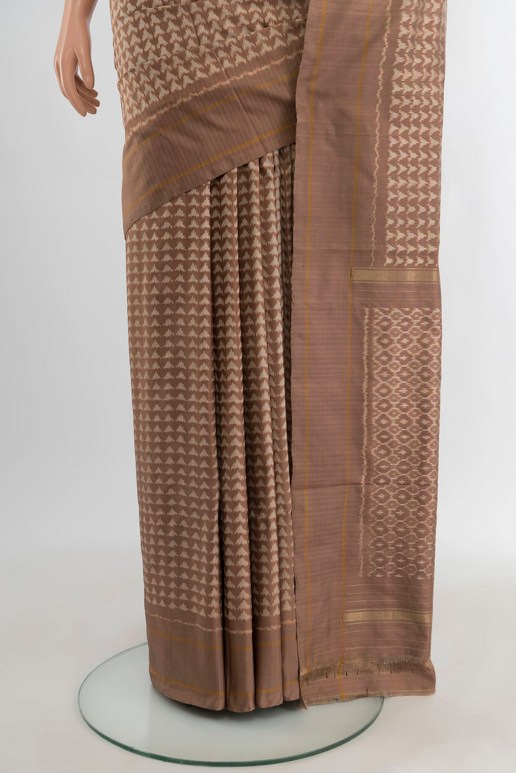 Pleats and pallu of Brown Pochampally Silk Saree with Ikat design on the body and Plain Border. 