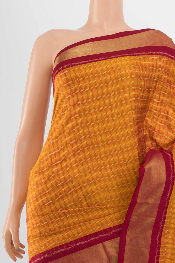 Border image of Mustard Pochampally Saree with Ikat Print on the body and Silk Border. 