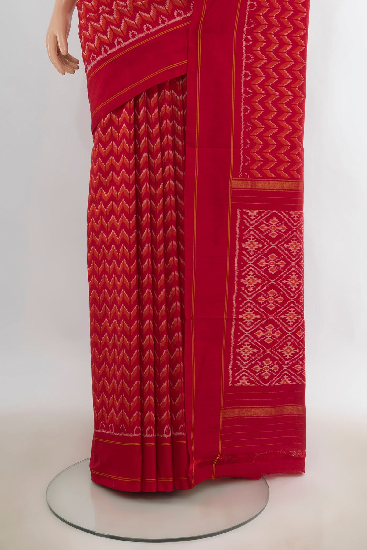 Pleats and pallu of Pure Silk Red Pochampally Saree with Pure Ikat on the body and Plain Border. 