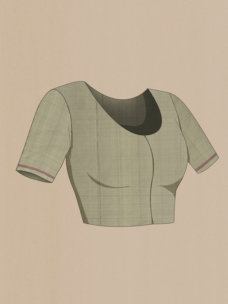 Close up image of the blouse of Pista Green Pochampally Saree with Ikat Print on the body and Silk Border. 