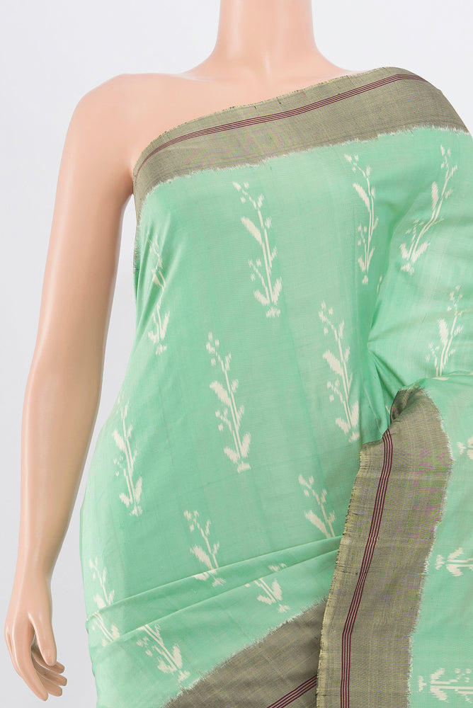Border image of Pista Green Pochampally Saree with Ikat Print on the body and Silk Border. 