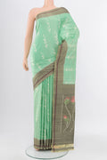 Pista Green Pochampally Saree with Ikat Print on the body and Silk Border.  displayed on a mannequin