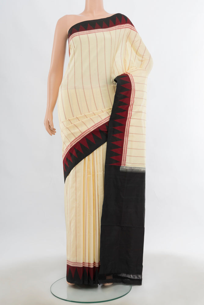 Cream Pochampally Saree with Ikat Print on the body and Fancy Border.  displayed on a mannequin