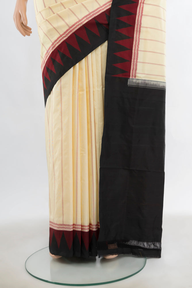 Pleats and pallu of Cream Pochampally Saree with Ikat Print on the body and Fancy Border. 