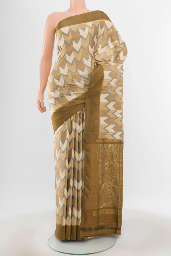 Pure Silk Pure Zari Multi Color Pochampally Saree with Ikat Print on the body and Silk Border.  displayed on a mannequin