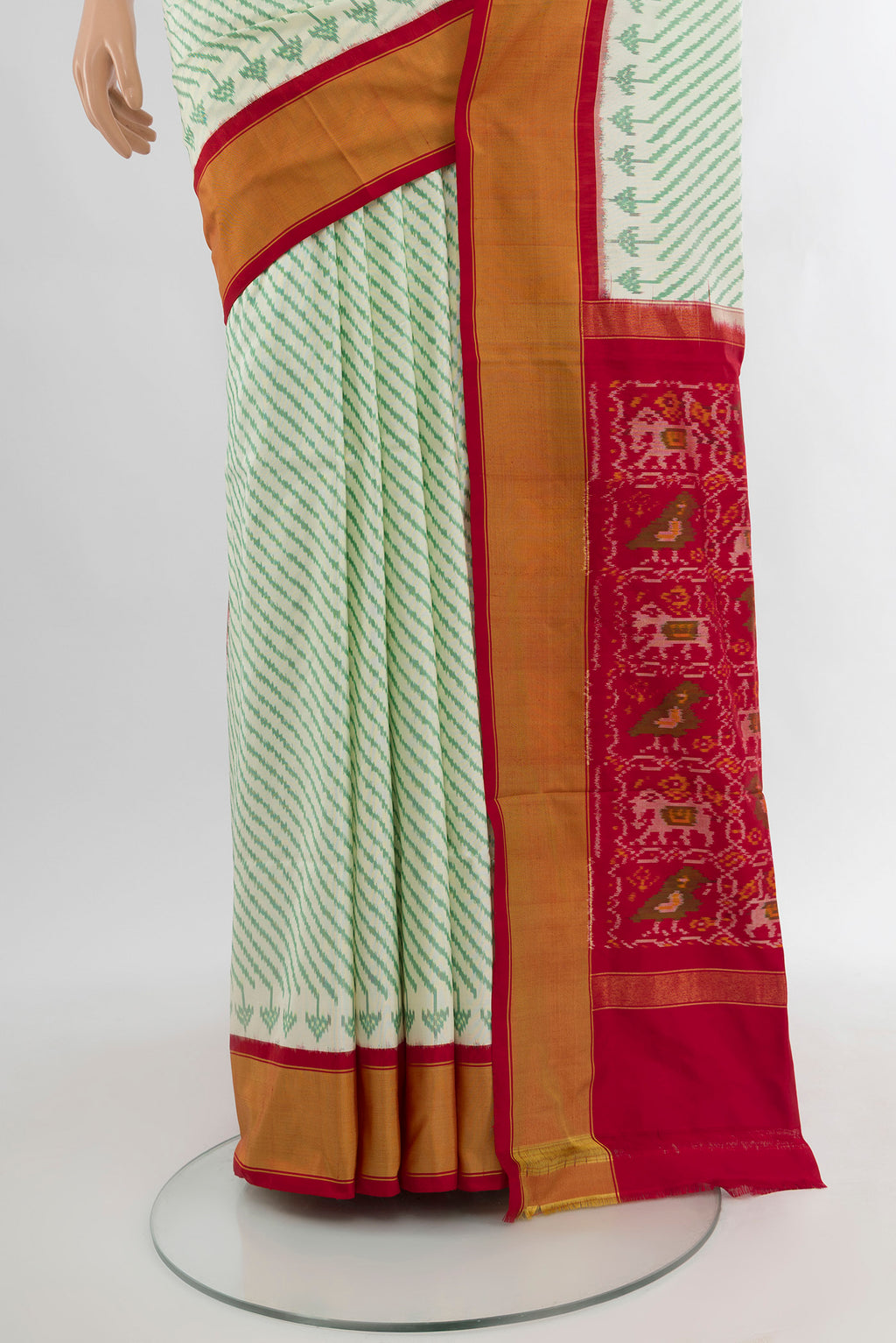 Pleats and pallu of Cream Pochampally Silk Saree with Ikat Print on the body and Silk Border. 