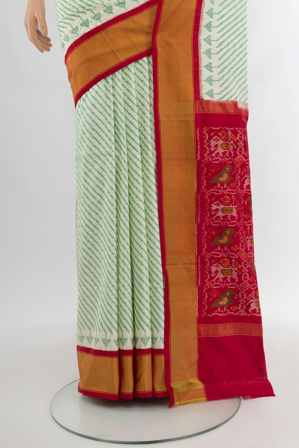 Pleats and pallu of Cream Pochampally Silk Saree with Ikat Print on the body and Silk Border. 