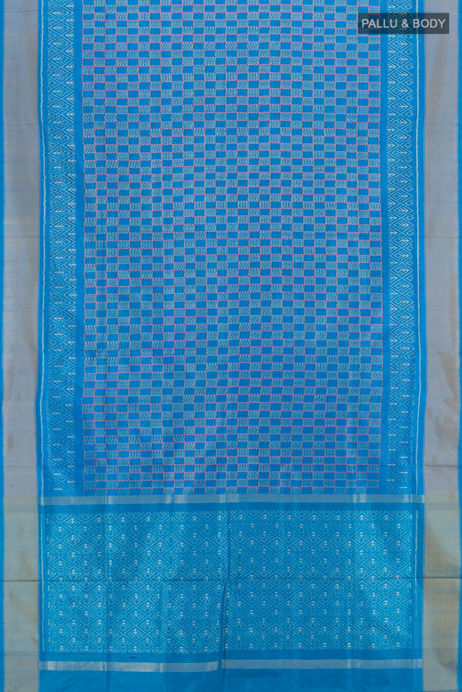 Flat view of Blue Pochampally Saree with Ikat Print on the body and Silk Border. 