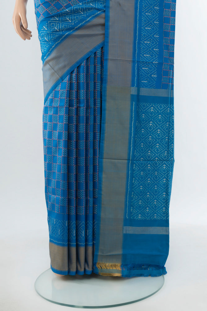 Pleats and pallu of Blue Pochampally Saree with Ikat Print on the body and Silk Border. 