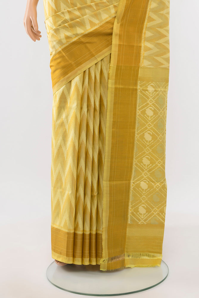 Pleats and pallu of Lemon Yellow Pochampally Saree with Ikat Print on the body and Silk Border. 