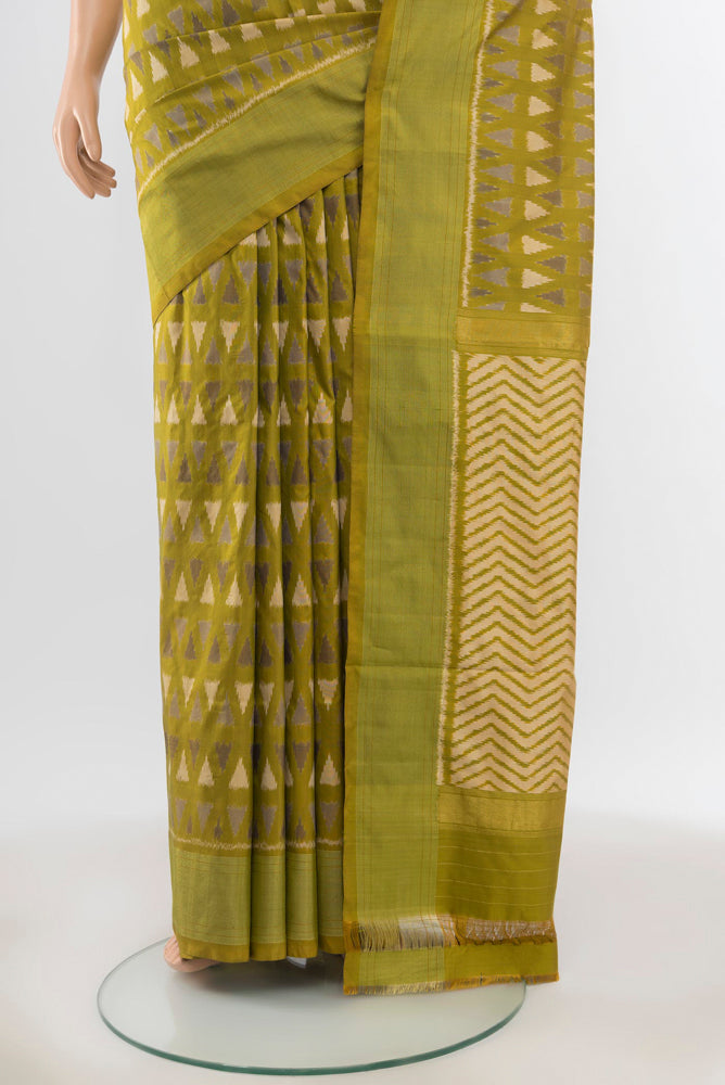 Pleats and pallu of Pure Silk Pure Zari Mehandi Green Pochampally Saree with Ikat Print on the body and Silk Border. 