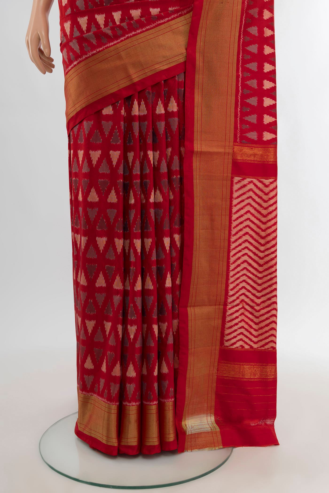 Pleats and pallu of Red Pochampally Silk Saree with Ikat design on the body and Zari Border. 