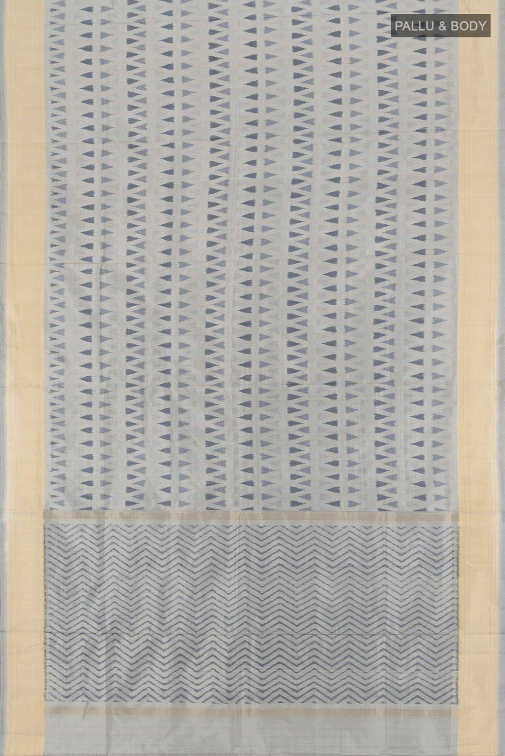 Flat view of Davys Grey Pochampally Silk Saree with Ikat design on the body and Zari Border. 
