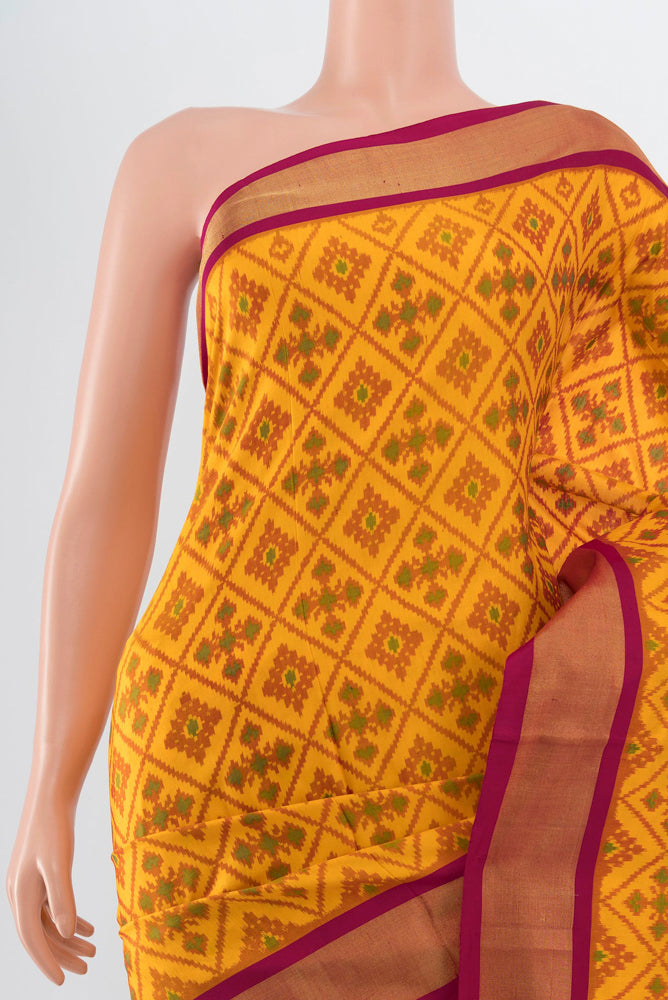 Border image of Pure Silk Pure Zari Yellow Pochampally Saree with Ikat Print on the body and Silk Border. 