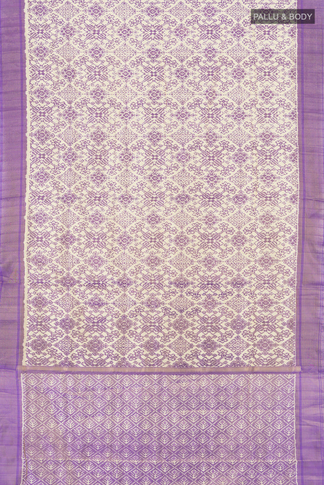 Flat view of Golden Pochampally Saree with Ikat Print on the body and Silk Border. 