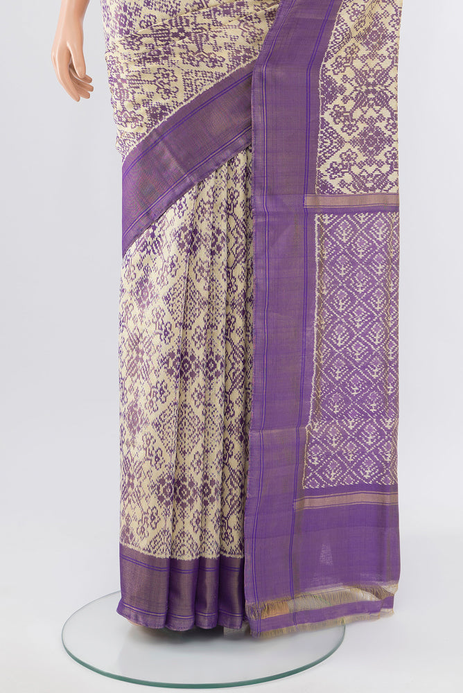 Pleats and pallu of Golden Pochampally Saree with Ikat Print on the body and Silk Border. 