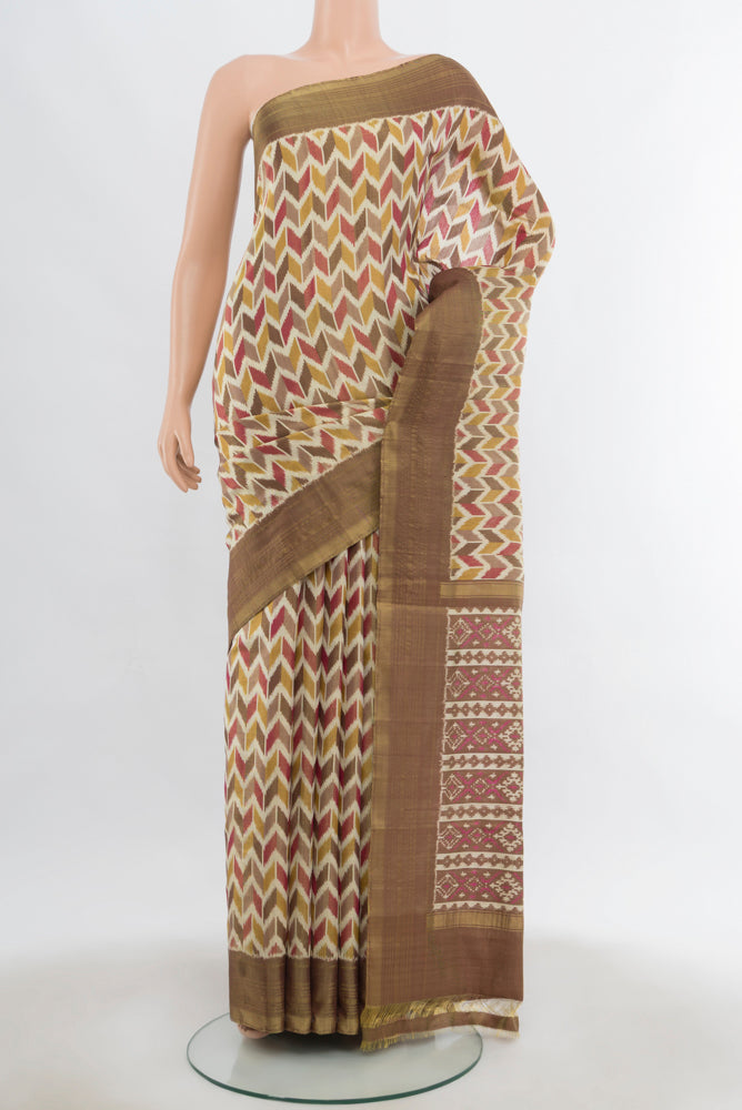 Multi Color Pochampally Saree with Ikat Print on the body and Fancy Border.  displayed on a mannequin