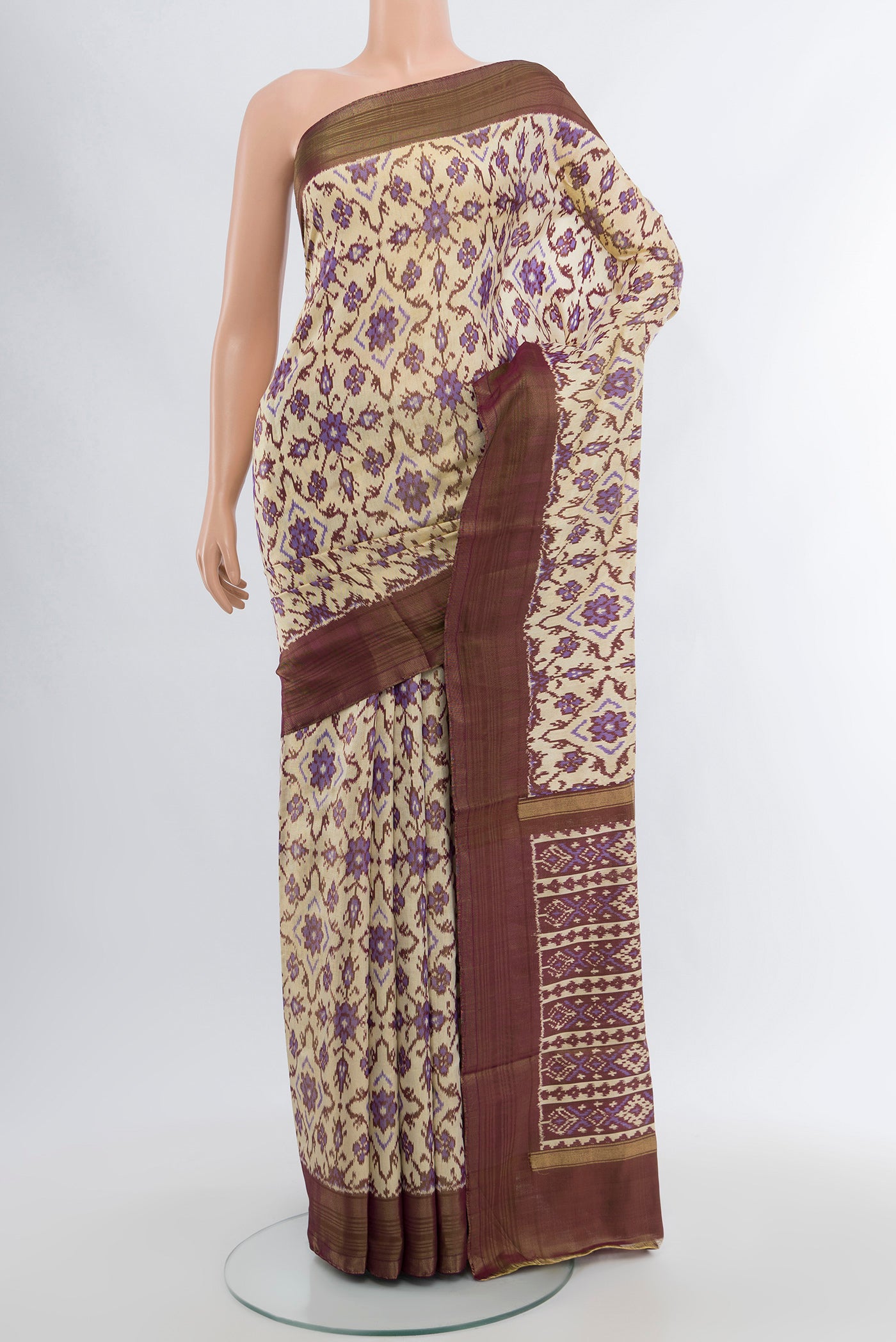 Multi Color Pochampally Silk Saree with Ikat Print on the body and Silk Border.  displayed on a mannequin