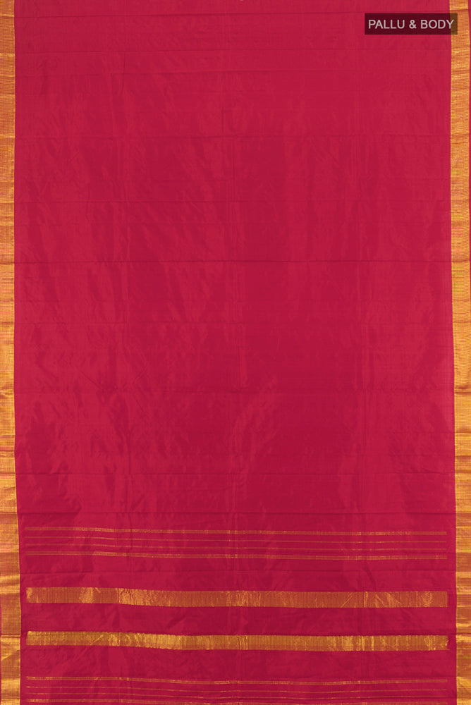 Flat view of Pure Silk Pure Zari Maroon Kanjivaram Saree with Zari Butta on the body and Silk Border. 