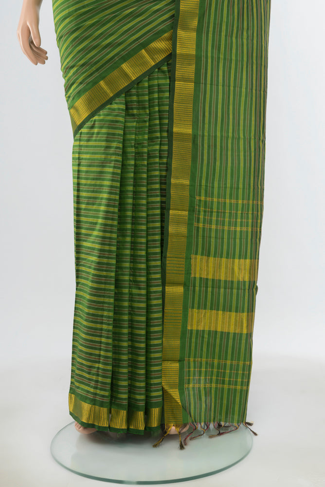 Pleats and pallu of Pure Silk Pure Zari Light Green Kanjivaram Saree with Checked design on the body and Silk Border. 