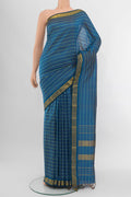 Dark Blue Kanjivaram Silk Saree with Zari Butta on the body and Silk Border.  displayed on a mannequin