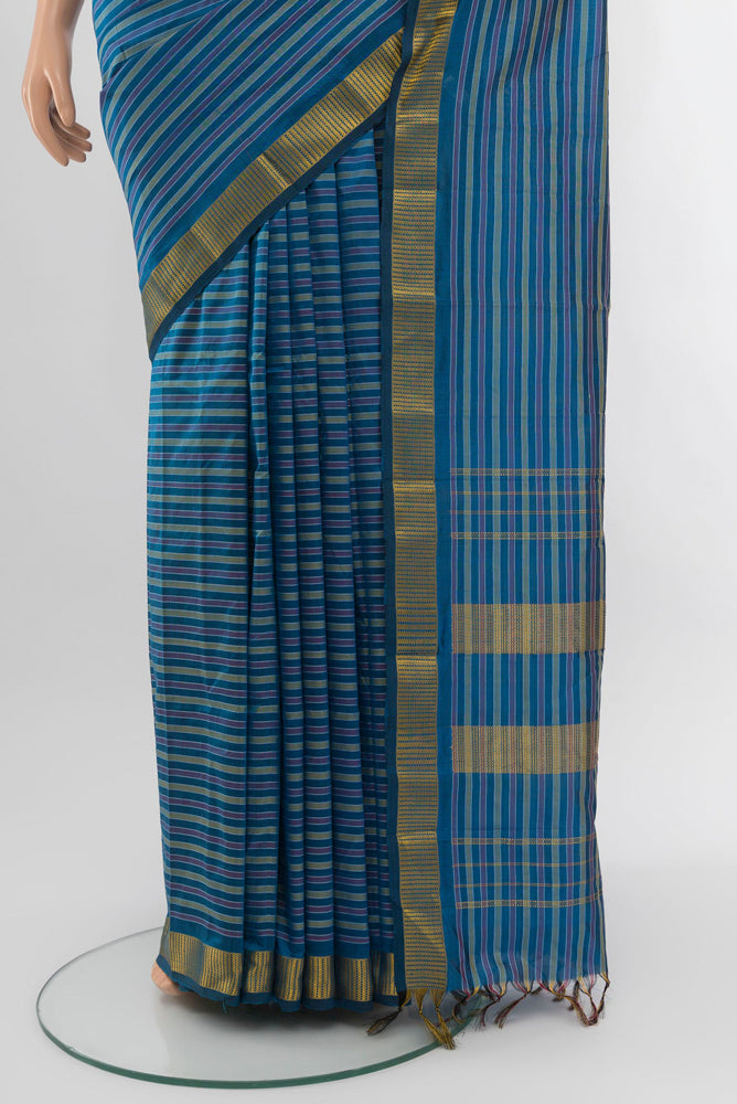 Pleats and pallu of Dark Blue Kanjivaram Silk Saree with Zari Butta on the body and Silk Border. 