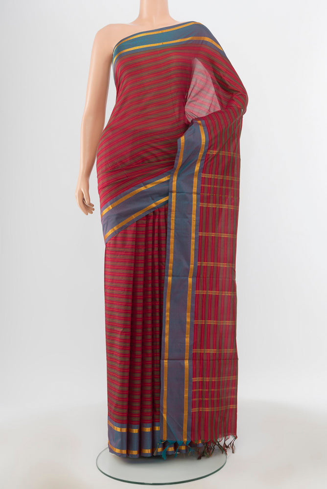 Pure Silk Pure Zari Multi Color Kanchipuram Nine Yards Saree with Zari Butta on the body and Silk Border.  displayed on a mannequin
