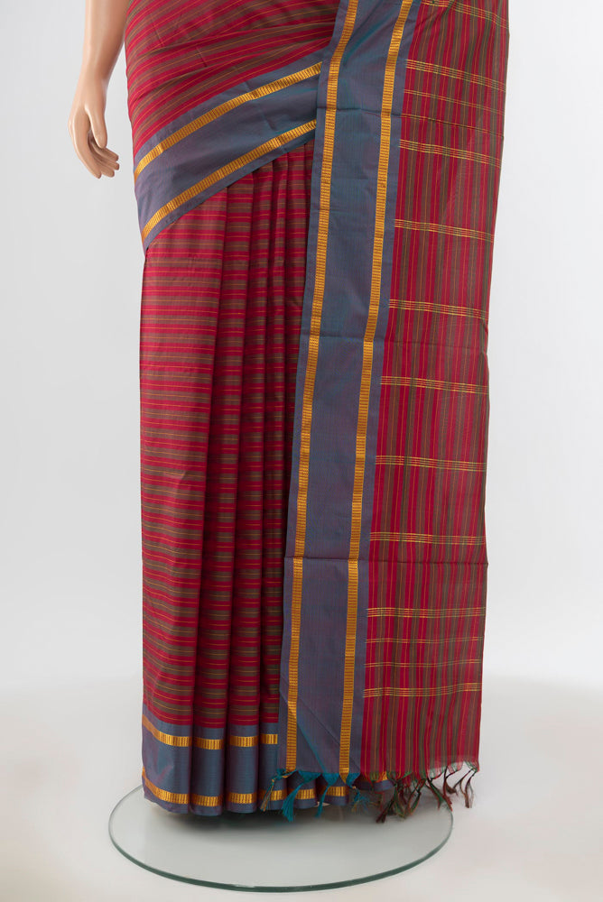 Pleats and pallu of Pure Silk Pure Zari Multi Color Kanchipuram Nine Yards Saree with Zari Butta on the body and Silk Border. 