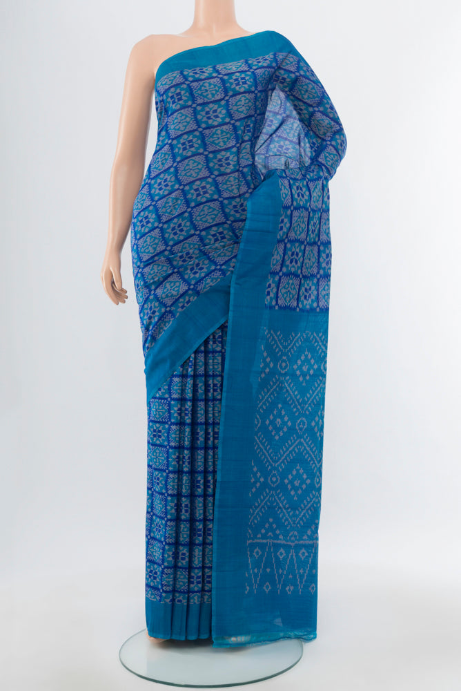 Blue Pochampally Saree with Ikat Print on the body and Silk Border.  displayed on a mannequin