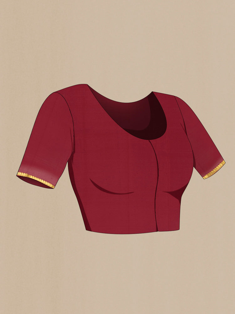 Close up image of the blouse of Maroon Mysore Crepe Saree with Zari Butta on the body and Silk Border. 