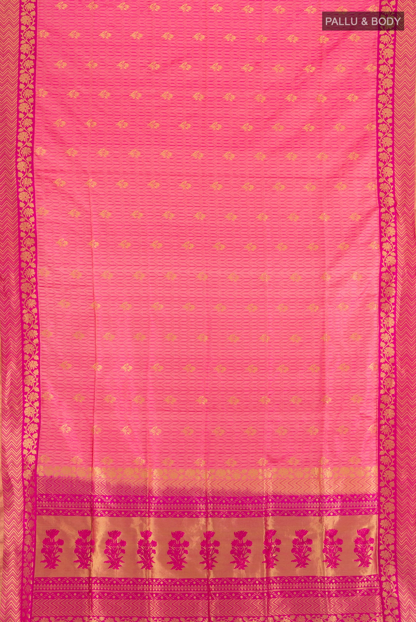 Flat view of Rose Gold Soft Silk Saree with Thread Butta on the body and Silk Border. 