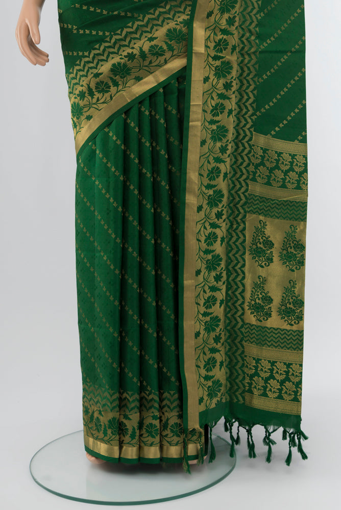 Pleats and pallu of Bottle Green Soft Silk Saree with Zari Butta on the body and Silk Border. 