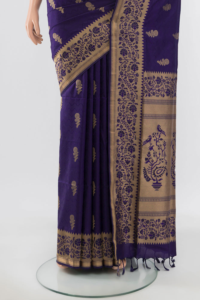 Pleats and pallu of Pure Silk Pure Zari Navy Blue Soft Saree with Zari Butta on the body and Silk Border. 