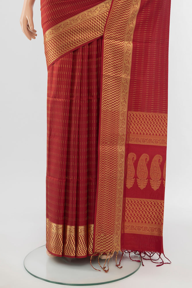 Pleats and pallu of Maroon Soft Silk Saree with Zari Brocade on the body and Silk Border. 