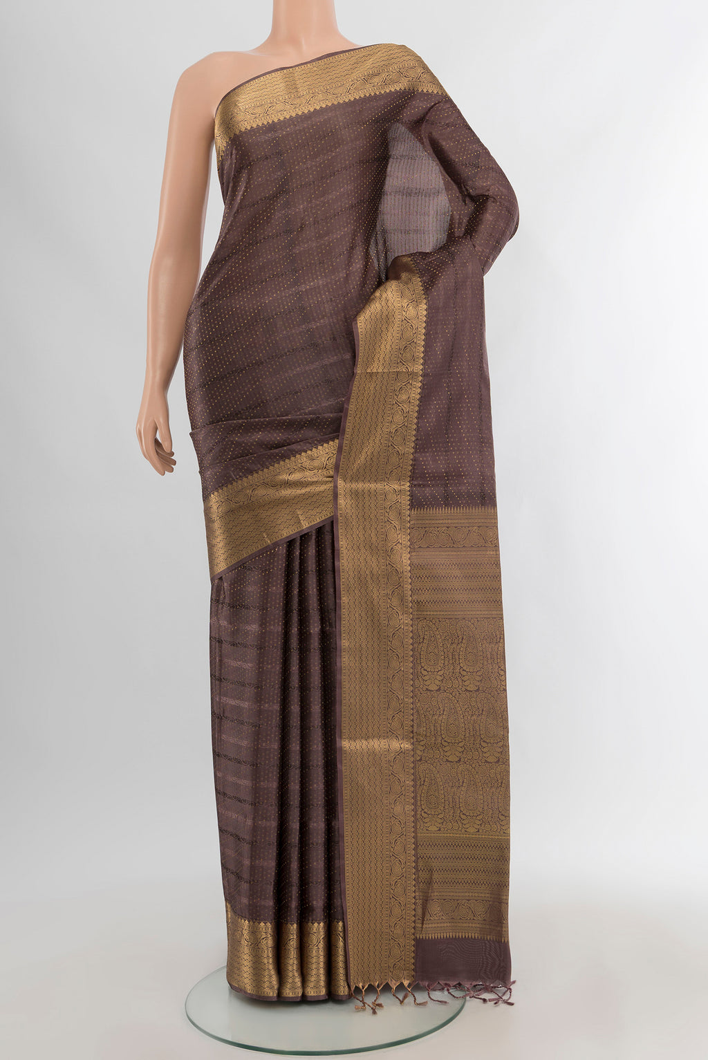 Brown Soft Silk Saree with Jacquard With Zari Butta on the body and Zari Border.  displayed on a mannequin