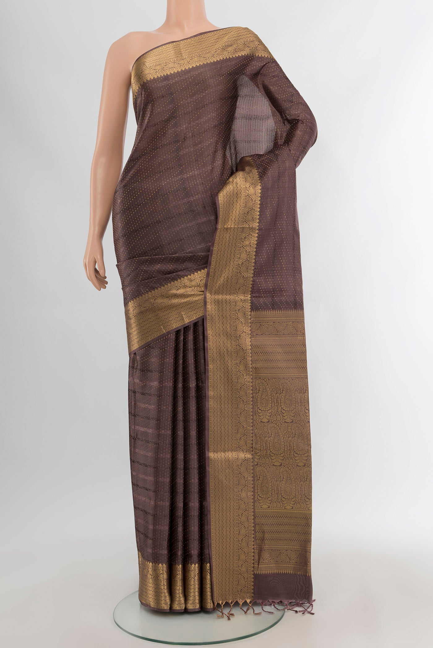Brown Soft Silk Saree with Jacquard With Zari Butta on the body and Zari Border.  displayed on a mannequin