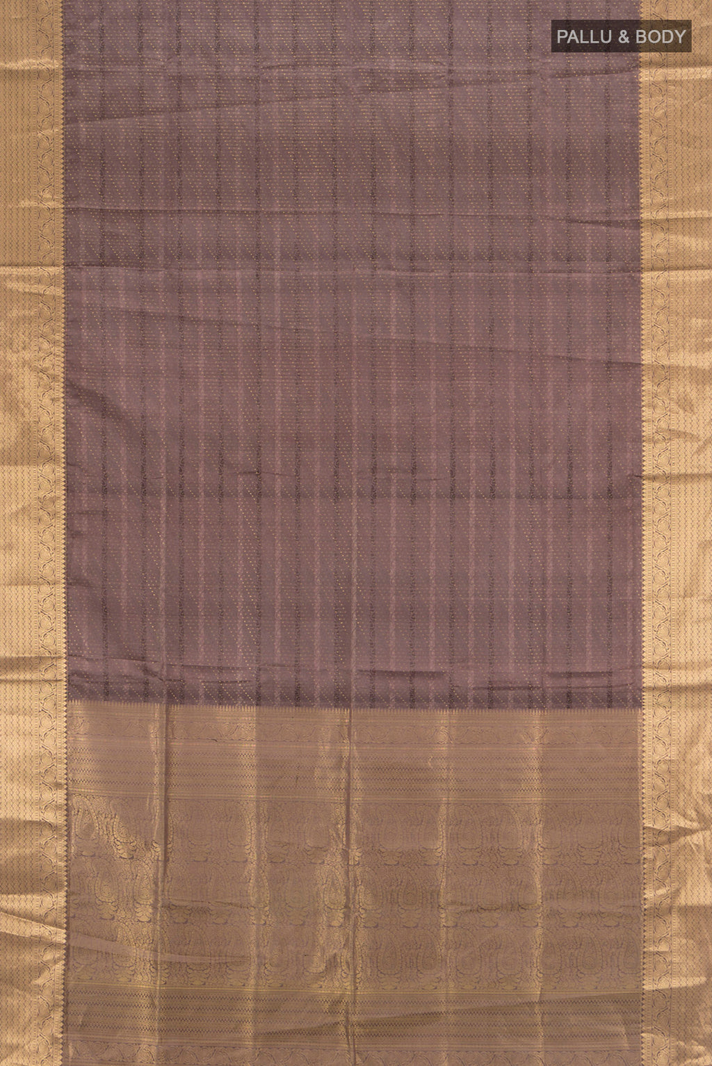 Flat view of Brown Soft Silk Saree with Jacquard With Zari Butta on the body and Zari Border. 